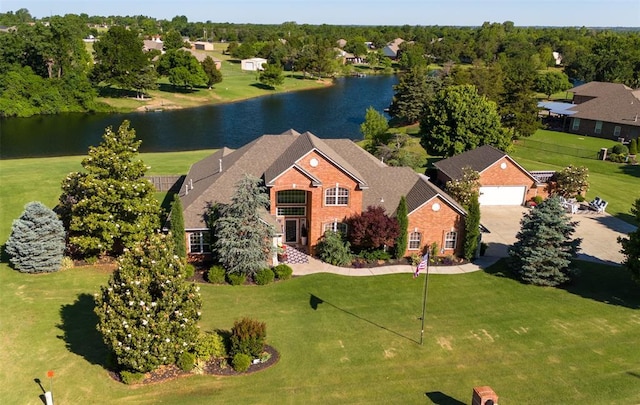 205 W Waterfront Dr, Tuttle, OK 73089 - aerial view of property and surrounding area with a nearby body of water