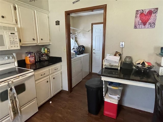 139 Sheridan Pl, Chickasha, OK 73018 - kitchen with white appliances, separate washer and dryer, dark countertops, and white cabinetry