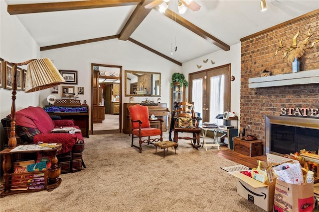 1205 Francis Ln, Kingfisher, OK 73750 - carpeted living room featuring ceiling fan and a fireplace