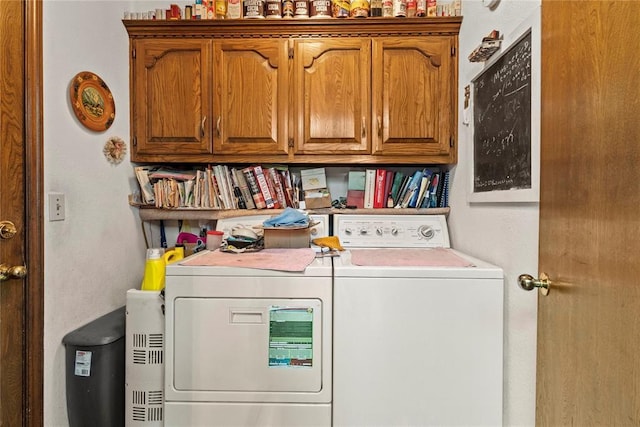 1205 Francis Ln, Kingfisher, OK 73750 - laundry area featuring washer and clothes dryer and cabinet space