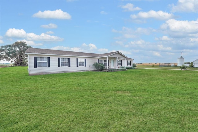 1318 N Cook St, Cordell, OK 73632 - view of front of property with a front yard and covered porch