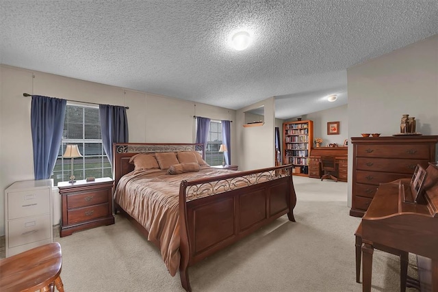 1318 N Cook St, Cordell, OK 73632 - bedroom featuring a textured ceiling, light carpet, and lofted ceiling