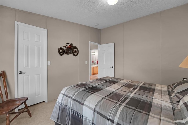 1318 N Cook St, Cordell, OK 73632 - bedroom featuring light colored carpet and a textured ceiling
