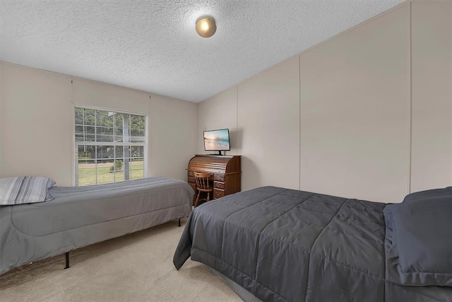 1318 N Cook St, Cordell, OK 73632 - bedroom with light colored carpet and a textured ceiling