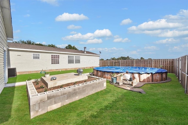 1318 N Cook St, Cordell, OK 73632 - view of yard featuring central AC
