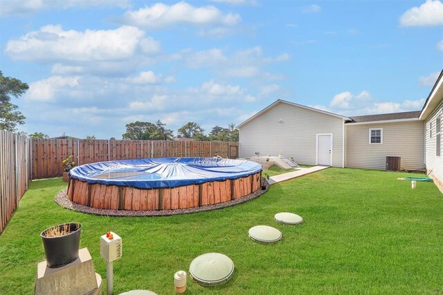 1318 N Cook St, Cordell, OK 73632 - view of yard with central AC unit