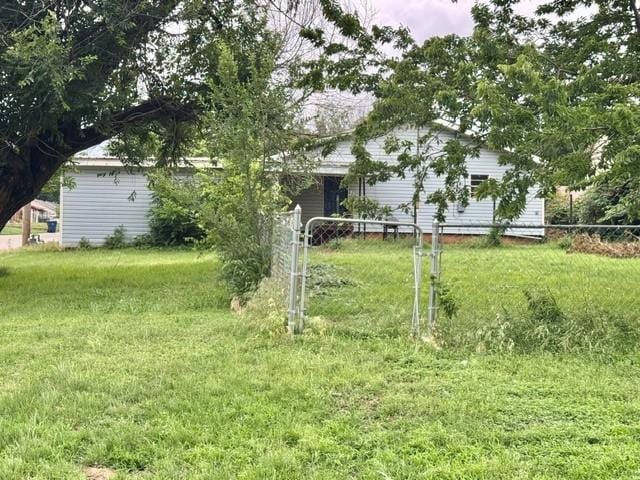 1502 S 12th St, Chickasha, OK 73018 - view of green lawn