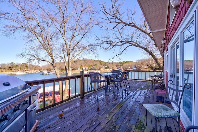 926 Park Cove Ln, Eucha, OK 74342 - deck featuring outdoor dining area, a water view, and a grill