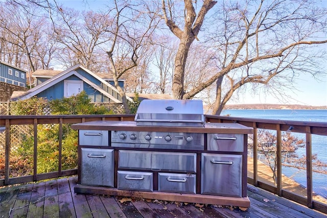 926 Park Cove Ln, Eucha, OK 74342 - wooden terrace with a water view and grilling area