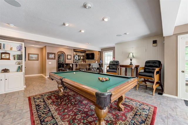 1736 Bryant Cir, Norman, OK 73026 - game room with baseboards, stone tile floors, pool table, and a textured ceiling