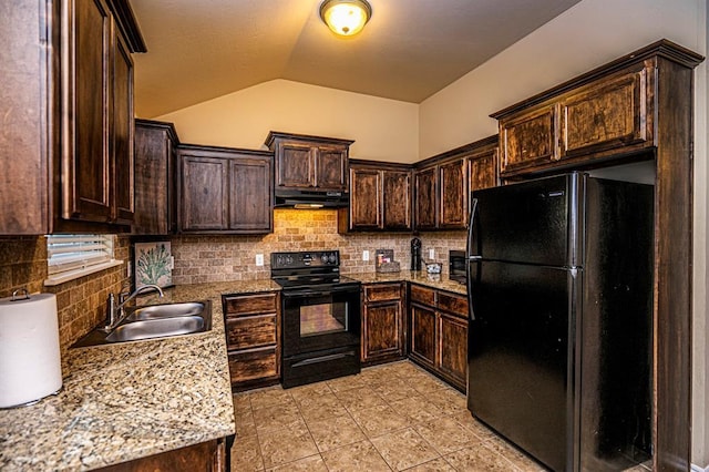 12604 William Penn Blvd, Oklahoma City, OK 73103 - kitchen featuring black appliances, under cabinet range hood, dark brown cabinetry, lofted ceiling, and backsplash