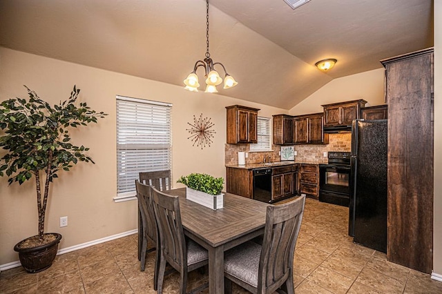 12604 William Penn Blvd, Oklahoma City, OK 73103 - dining space featuring vaulted ceiling, a chandelier, and light tile patterned floors