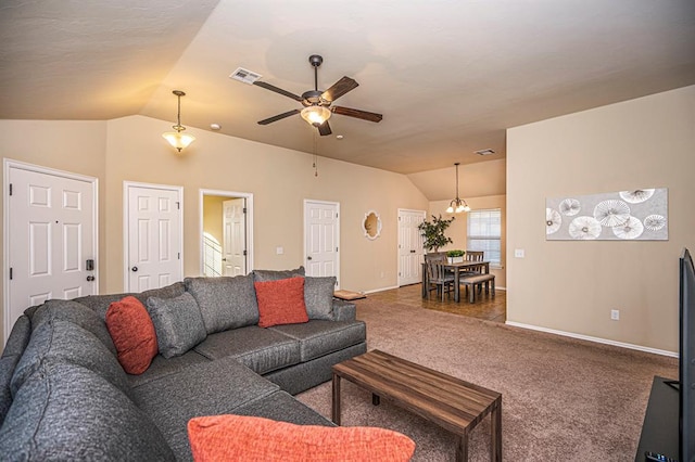 12604 William Penn Blvd, Oklahoma City, OK 73103 - living area with lofted ceiling, a ceiling fan, carpet flooring, and a chandelier