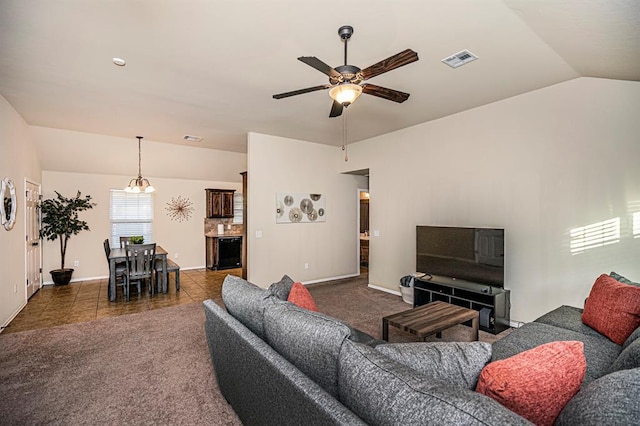 12604 William Penn Blvd, Oklahoma City, OK 73103 - living room with ceiling fan, lofted ceiling, carpet flooring, and wine cooler