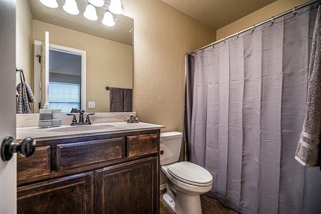 12604 William Penn Blvd, Oklahoma City, OK 73103 - bathroom with a textured wall and vanity