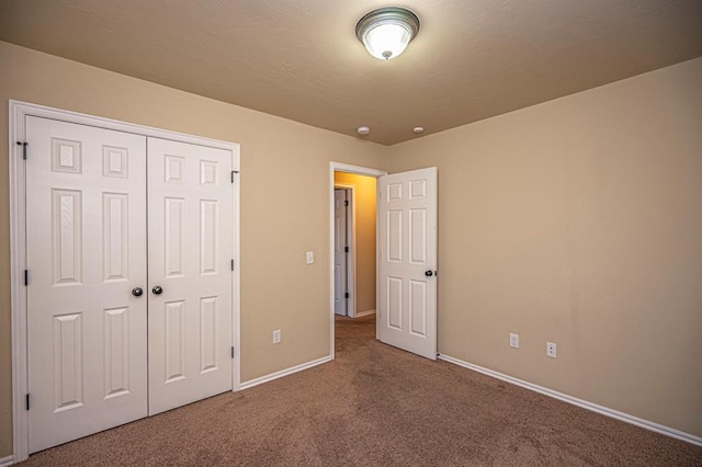 12604 William Penn Blvd, Oklahoma City, OK 73103 - unfurnished bedroom featuring carpet floors and a closet