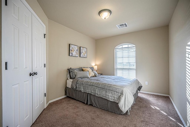 12604 William Penn Blvd, Oklahoma City, OK 73103 - bedroom featuring carpet flooring and a closet