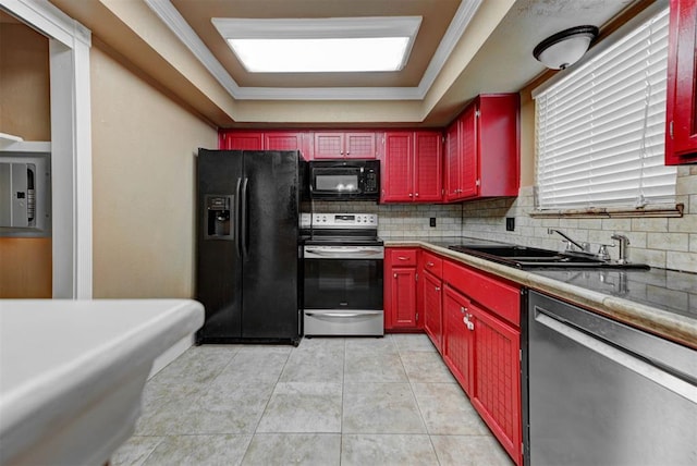 846 Two Forty Pl, Oklahoma City, OK 73139 - kitchen featuring black appliances, decorative backsplash, light tile patterned floors, ornamental molding, and a tray ceiling