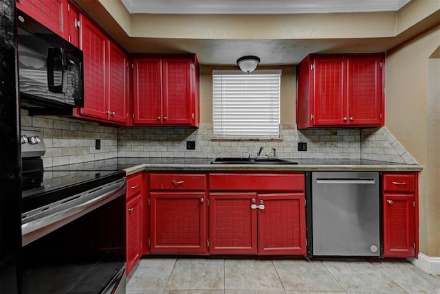 846 Two Forty Pl, Oklahoma City, OK 73139 - kitchen featuring stainless steel appliances, tasteful backsplash, crown molding, red cabinetry, and light tile patterned floors