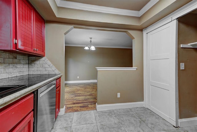 846 Two Forty Pl, Oklahoma City, OK 73139 - kitchen featuring stainless steel dishwasher, crown molding, arched walkways, a chandelier, and tasteful backsplash