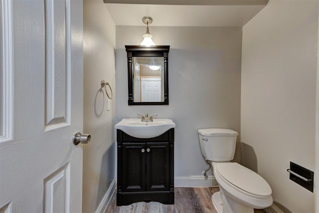 846 Two Forty Pl, Oklahoma City, OK 73139 - half bath featuring vanity and wood finished floors