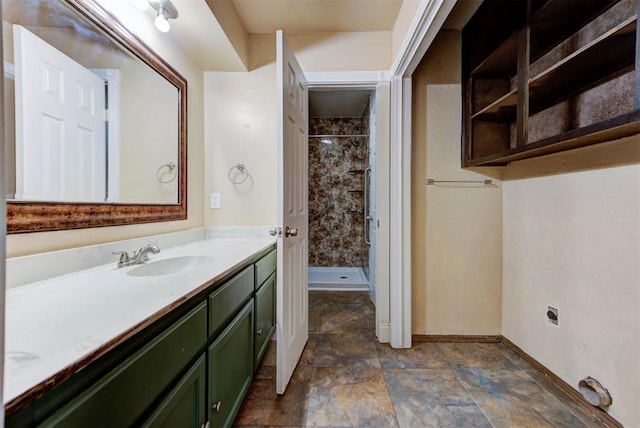 846 Two Forty Pl, Oklahoma City, OK 73139 - bathroom featuring vanity, a shower stall, and stone finish floors