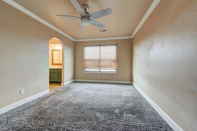 846 Two Forty Pl, Oklahoma City, OK 73139 - empty room featuring crown molding, a ceiling fan, light carpet, and arched walkways