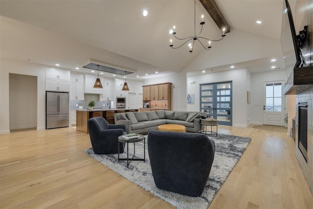 6524 NE 96th Cir, Oklahoma City, OK 73151 - living area featuring beamed ceiling, a chandelier, light wood-style flooring, recessed lighting, and high vaulted ceiling