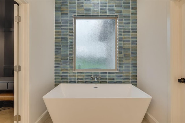 6524 NE 96th Cir, Oklahoma City, OK 73151 - full bathroom featuring a freestanding bath and healthy amount of natural light