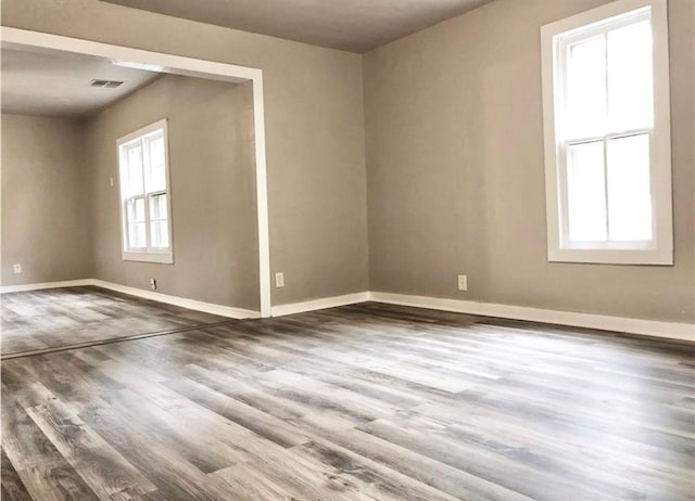 16204 Gaddy Rd, Shawnee, OK 74801 - empty room featuring wood finished floors and baseboards