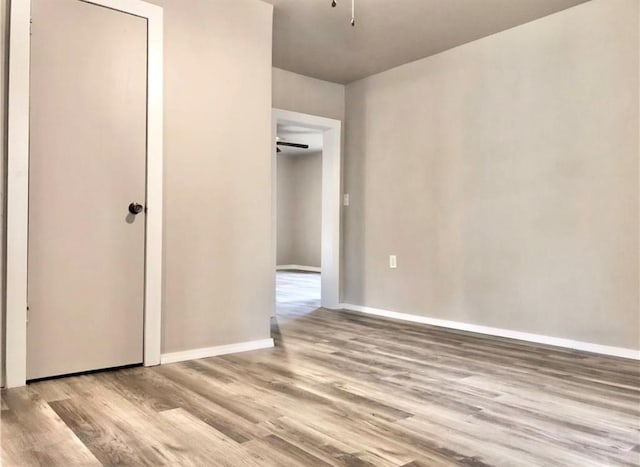 16204 Gaddy Rd, Shawnee, OK 74801 - unfurnished bedroom featuring wood finished floors and baseboards