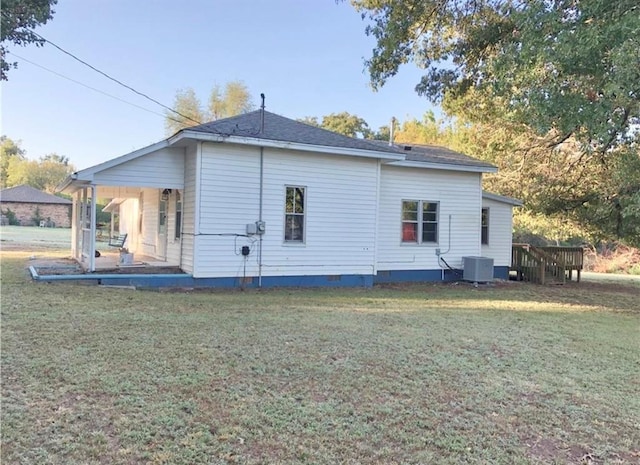 16204 Gaddy Rd, Shawnee, OK 74801 - rear view of property with a lawn, crawl space, and central air condition unit