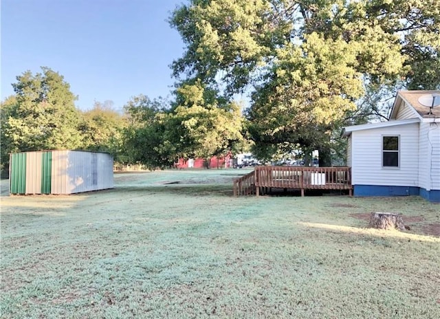 16204 Gaddy Rd, Shawnee, OK 74801 - view of green lawn featuring a wooden deck