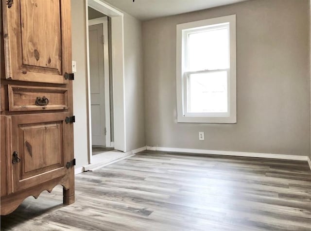 16204 Gaddy Rd, Shawnee, OK 74801 - spare room featuring baseboards and light wood-style flooring