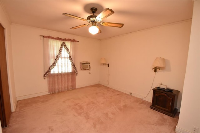 220 E Tiger Ave, Wetumka, OK 74883 - empty room with a wall mounted AC, light colored carpet, a ceiling fan, and baseboards