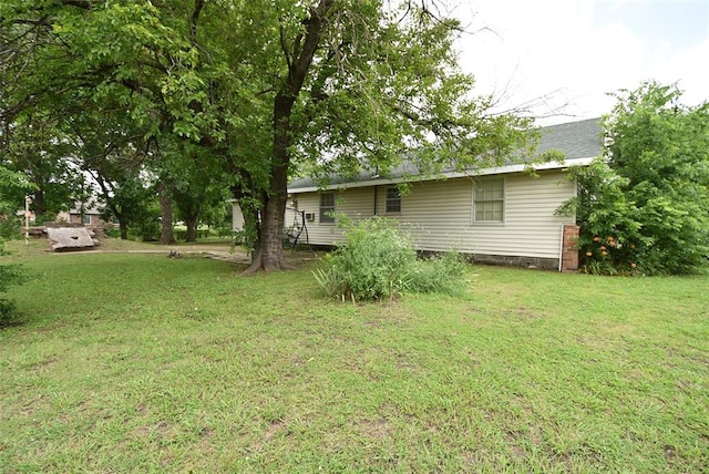 220 E Tiger Ave, Wetumka, OK 74883 - view of green lawn