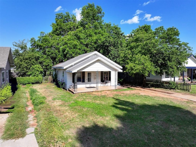 1407 S 9th St, Chickasha, OK 73018 - view of front of home with a porch