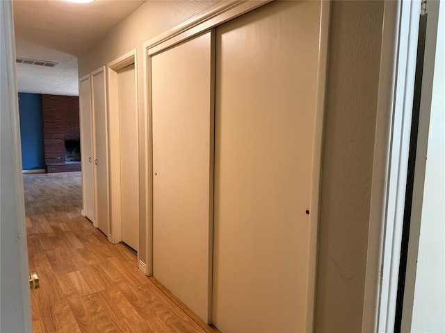 2125 Fremont Dr, The Village, OK 73120 - hallway with light wood-type flooring and baseboards