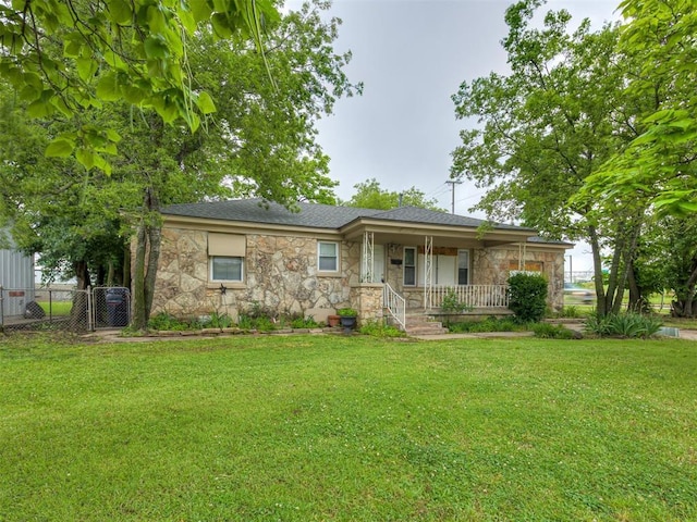 3236 SW 37th St, Oklahoma City, OK 73119 - ranch-style home with stone siding and a porch
