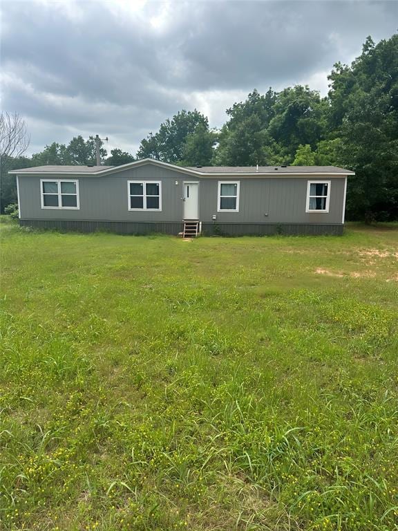 332841 E 890th Rd, Wellston, OK 74881 - manufactured / mobile home with entry steps and a front lawn