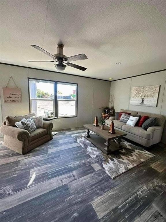 332841 E 890th Rd, Wellston, OK 74881 - living area with a textured ceiling, wood finished floors, and ceiling fan