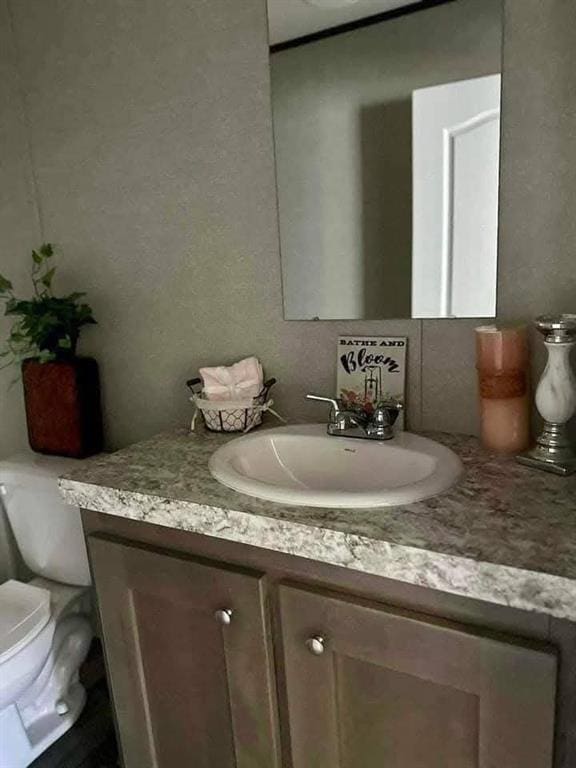 332841 E 890th Rd, Wellston, OK 74881 - bathroom featuring vanity and toilet