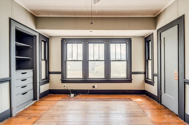 816 W Padon St, Blackwell, OK 74631 - spare room with light wood finished floors, baseboards, and plenty of natural light