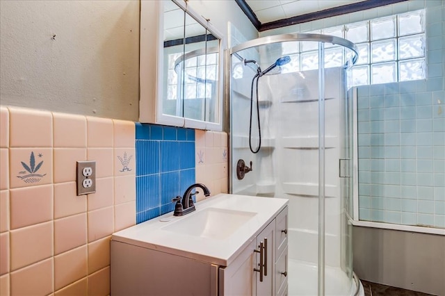 816 W Padon St, Blackwell, OK 74631 - bathroom with a shower stall, vanity, and tile walls