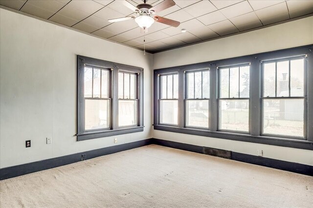 816 W Padon St, Blackwell, OK 74631 - carpeted spare room with a ceiling fan and baseboards