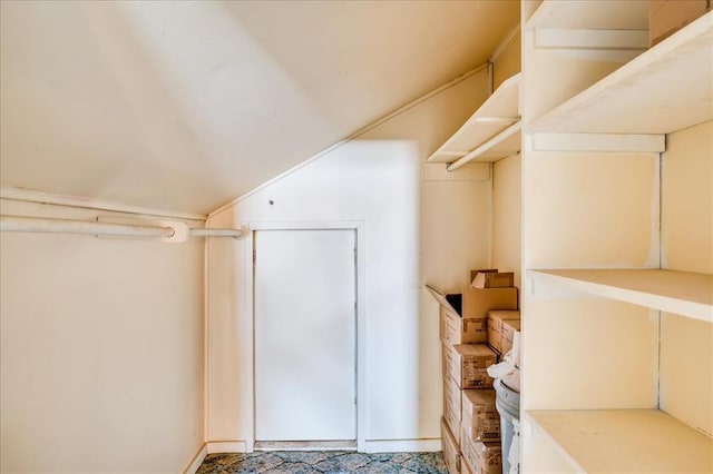 816 W Padon St, Blackwell, OK 74631 - walk in closet featuring lofted ceiling