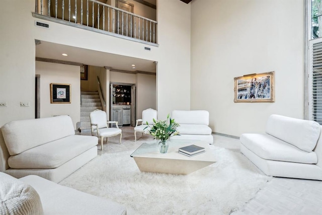 6206 Waterford Blvd Unit 78, Oklahoma City, OK 73118 - living room with stairs, a high ceiling, baseboards, carpet floors, and recessed lighting