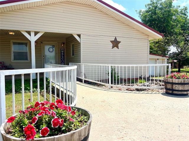 416 E Quail Rd, Chickasha, OK 73018 - doorway to property featuring covered porch