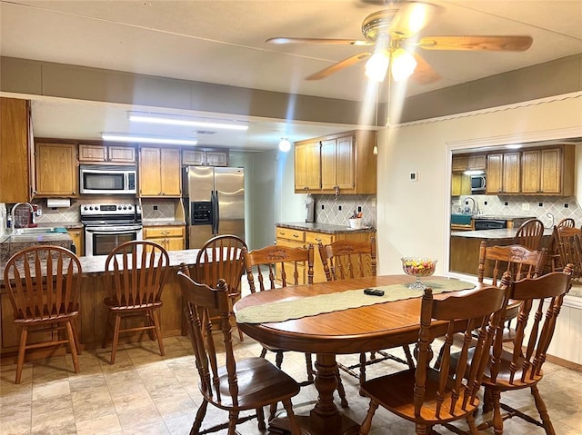416 E Quail Rd, Chickasha, OK 73018 - dining room with ceiling fan