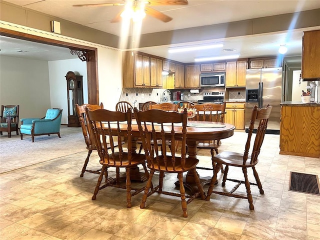 416 E Quail Rd, Chickasha, OK 73018 - dining area with a ceiling fan